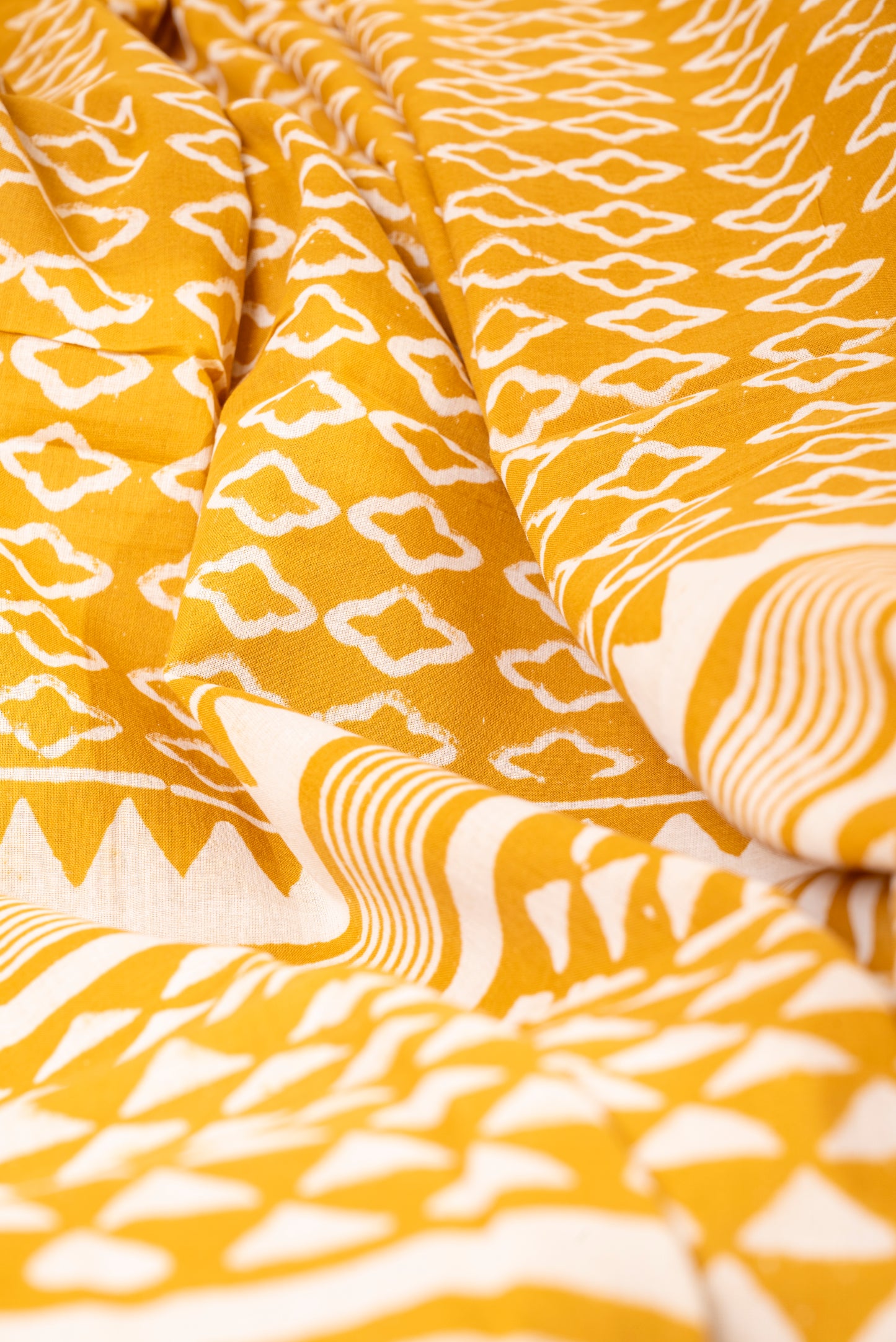 YELLOW WHITE BLOCK PRINT MULMUL SARI
