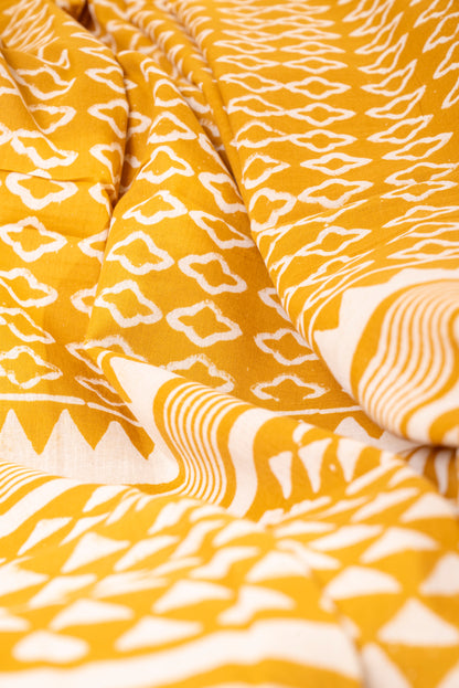 YELLOW WHITE BLOCK PRINT MULMUL SARI