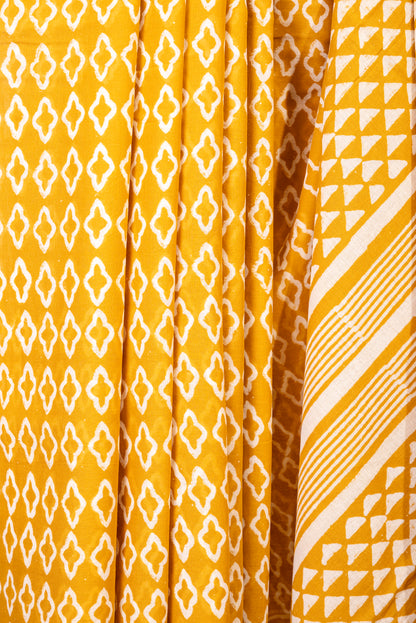YELLOW WHITE BLOCK PRINT MULMUL SARI